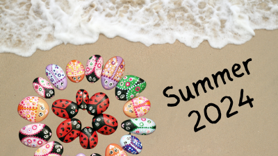 Beach with ladybug rocks and Summer 2024
