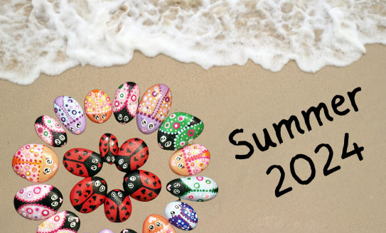 Beach with ladybug rocks and Summer 2024